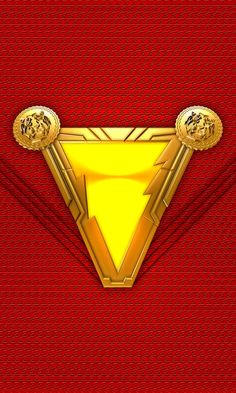 a red and yellow background with two golden objects on it's face, in the shape of a triangle