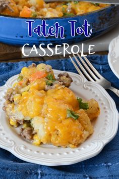 a casserole with meat and vegetables on it is sitting on a white plate