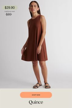 This mini swing dress is as flattering as it is flirty. Made with our soft Tencel™ fabric, the relaxed fit and flared hem creates a silhouette that flatters every form. Tencel™ lyocell is a biodegradable fabric made from cellulose found in wood pulp. It is softer, more breathable, and uses 10-20 times less water in production compared to cotton.  | Quince | Women's Tencel Jersey Mini Swing Dress in Brown, Size XS Quince, Swing Dress, Perfect Fit, Shop Now, Relaxed Fit, Size Medium, Water, Wood, Fabric