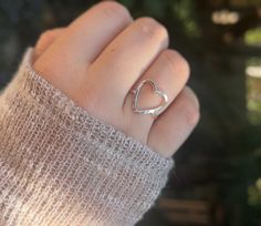 A handmade sterling silver heart ring. This ring is the perfect Gift for Mom, Sister, Wife, Grandmother, daughter or friend to wear as a reminder that YOU ARE LOVED.   HOW TO ORDER: first, select your desired metal and then add to cart!  💍PRODUCT DETAILS   - Made with your choice of .925 Sterling silver or 14k gold filled material - band and heart are 1.4mm thick - no 2 rings are exactly the same due to the nature of handmade - the scale of smaller to larger ring sizes will affect how large the heart will be so that it fits to your ring size!  - each heart ring is hammered to achieve a beautiful textured finish on your rings! -  🔑What is 14k Gold-Filled?  Gold-filled is the next best option to 14k solid gold. It is a less expensive option and it is hypoallergenic and water safe. Gold-fil Best Friend Rings, Daughter Best Friend, Open Heart Ring, Cotton Jewelry, Friend Rings, Silver Heart Ring, 2 Rings, Sister Wife, Statement Ring Silver