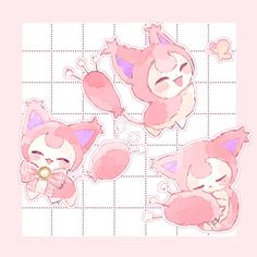 some pink stickers with cats on them