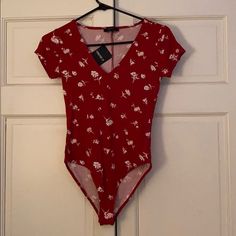 Forever21 Nwt Dark Red Floral Ribbed Body Suit Size Small. Fitted V-neck Floral Print Bodysuit, Red Fitted V-neck Bodysuit, Fitted Red V-neck Bodysuit, Spring Red V-neck Bodysuit, Red V-neck Bodysuit For Spring, Red Casual Bodysuit For Spring, Casual Red Bodysuit For Spring, Fitted Red Forever 21 Top, Trendy Fitted Red Bodysuit