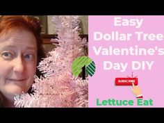 a woman holding up a pink christmas tree with the words, easy dollar tree valentine's day diy