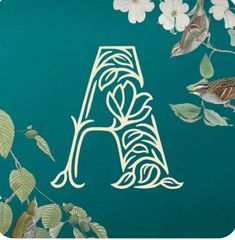 a bird sitting on top of a green wall next to white flowers and leaves with the letter a in it's center