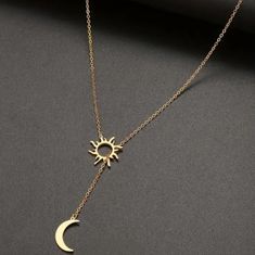 Features A Moon And Sun In Stainless Steel With 18kt Gold Plating Necklace Is Around 23.62 Inches Moon And Sun Pendant, Gold Charm Necklaces With Sun And Moon Design, Gold Dangle Necklaces With Moon Charm, Elegant Gold Charm Necklaces With Sun And Moon Design, Elegant Gold Charm Necklace With Sun And Moon Design, Elegant Gold-plated Sun And Moon Necklace, Elegant Adjustable Sun And Moon Necklace, Minimalist Gold Necklace With Sun And Moon Design, Baddie Jewelry