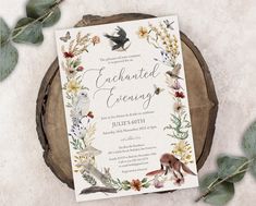 the wedding card is surrounded by flowers and birds