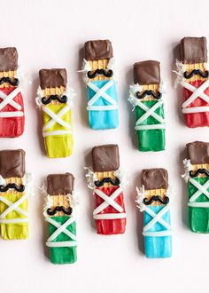 small candy candies decorated like nutcrackers with ribbons