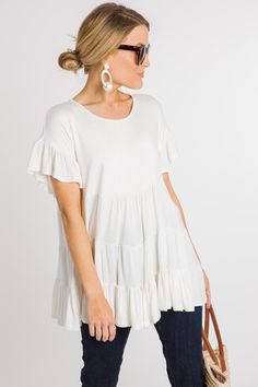 Tiered Tunic Tee, White :: NEW ARRIVALS :: The Blue Door Boutique White Tiered Top With Ruffle Hem, White Tiered Casual Tops, Casual White Tiered Top, Tiered Tops For Layering, Casual Tiered Tops For Brunch, Flowy Tiered Tops For Day Out, Casual Flowy Tiered Top, Boutique Clothing, Peplum Top