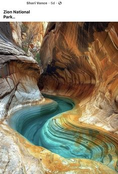 a river flowing through a canyon surrounded by rocks