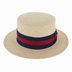 When looking for a traditional boater/skimmer, the Belfry Venice is our finest choice. It is made of tightly woven genuine Panama straw and features a flat crown and brim. The classic club hat band in navy and red striping is finished in a single bow, and adds lots of vintage style. Handmade in the USA, the Venice showcases fine American craftsmanship. FEATURESStyle: Boater/SkimmerMaterial: Genuine Panama StrawDimensions: 3 1/2 Crown, 2 1/2" BrimBand: Grosgrain Ribbon Adjustable Flat Crown Boater Hat In Toquilla Straw, Classic Straw Boater Hat, Classic Straw Boater Hat With Short Brim, Classic Boater Hat With Flat Crown, Casual Natural Hat Bands With Flat Crown, Natural Adjustable Boater Hat With Flat Crown, Classic Toquilla Straw Boater Hat, Classic Woven Panama Hat With Flat Brim, Classic Beige Boater Hat For Spring