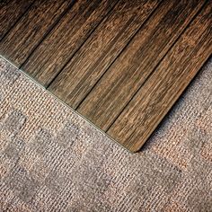 a close up of a wooden floor with carpeting on the bottom and top part