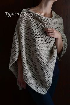 a woman wearing a white crocheted shawl