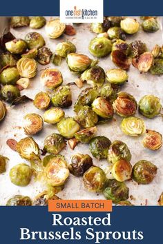 roasted brussel sprouts on a baking sheet with the title, small batch roasted brussel sprouts