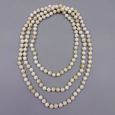 "Long or multi strand beaded hand knotted long endless infinity MOP necklace. -60\" length -8MM beads -Beautiful white mother of pearls https://www.etsy.com/shop/MYGEMSROCK" Elegant White Beaded Necklace For Meditation, Hand-strung White Multi-strand Necklace, White Single Strand Necklace With Round Beads, White Hand-strung Long Bead Necklace, White Hand-strung Long Necklace Beads, White Hand Knotted Jewelry With Round Beads, Hand Knotted White Round Bead Jewelry, White Pearl Long Necklace With Gemstone Beads, White Bohemian Necklace With Round Beads