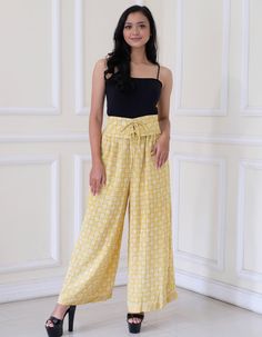 Batik elastic waist pants made with Indonesian batik cotton fabric.  Fit and Sizing: Female model is 160 cm tall. Yellow: Size chart: Medium: waist up to 82 cm (33 in), hip 88 cm (35 in), length 102 cm (41 in) Details: All around elastic waist band with corset like closure. Side pockets. Beige/Green Size chart: L (Large): waist 61-99 cm (24-39 in), hip up to 102 cm (40 in), length 82.5 cm (32.5 in) XL (Extra Large): waist 78-114 cm (27-45 in), hip up to 118 cm (46 in), length 85 cm (33.5 in) Det Indonesian Batik, Hip Ups, Womens Pants, Elastic Waist Pants, Female Model, Pants Women, Waist Pants, Waist Band, Batik