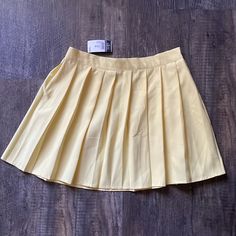 Hi, For Sale Is This New With Defects, Rue21 Skirt, In This Beautiful Light Yellow Color. See Below For More Details Couple Of Minor Flaws(Faint Marks, Material Pull In A Couple Of Areas) See Photos The Skirt Is Unlined Great Skirt, Ready For A New Home! Feel Free To Ask Questions. Thanks For Looking! Summer School Pleated Stretch Skirt, Summer School Flared Skirt, Summer School Pleated Lined Skirt, Summer School Lined Skirt, Summer School Skort, Summer School Pleated Bottoms, Spring School Mini Pleated Skirt, Summer School Skirt Bottoms, Summer School Tennis Skirt With Lining