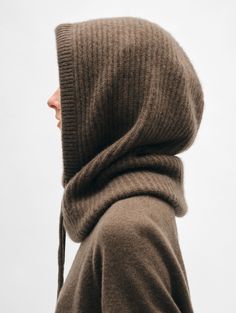 The balaclava is perfect for staying warm during the coldest days of the year. It’s made from lofty cashmere with a ribbed finish to lock in heat and accentuate the relaxed fit. The panel at the bottom keeps it looking neat under your coat. Details Hood Height 20 1/2". 100% Cashmere. Dry clean only. Style #21047 Knitted Hood Pattern, Coat Details, Hooded Cowl, Winter Must Haves, Days Of The Year, White Shop, Cold Day, Stay Warm, Winter Fashion