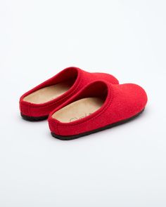 Description: The Nebraska Women's Wool Clog is an Italian take on a European classic. The women's Nebraska in red is one of the most versatile mule style slippers available. From home to the office to weekend, the minimalist design of these clogs will take you anywhere in comfort. The anatomical self-molding latex and thermoforming cork insole provide a firm customized comfort, and the insole is completely removable. LeClare Slippers are exclusively handcrafted in our small-batch factory in Trev Wool Clogs, The Minimalist, Red Wool, Small Batch, Nebraska, Mule, The Office, Minimalist Design, Clogs