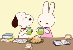 two dogs are sitting at a table drinking coffee and reading books while holding mugs