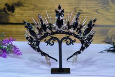 Dear buyers! I have good news I am resuming work after a break. Despite the difficult situation in the country, I am in a safe region and can work! I just want to warn you that the shipping time will be a little longer. A deluxe spiked crown for your cool gothic looks. Even higher, even more luxurious, even more spikes! Material: wire, crystal beads, strasses and metal elements. Crown height 8 cm Decoration will be sent to you in a beautiful gift box. Tips for care : wear with pleasure, keep awa Goth Wedding Crown, Vampire Themed Wedding, Melinoe Hades, Black And White Crown, Fantasy Tiara, Spiked Crown, Goth Crown, Gothic Tiara, Dark Crowns