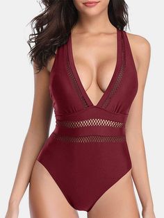 Features: Cutout, Crisscross Chest pad: Removable padding Underwire: No underwire Stretch: Moderate stretch Material composition: 82% nylon, 18% spandex. Care instructions: Machine wash cold. Tumble dry low. Imported Size US Top Length Bust Waist HIP S 4 0 33.9 26 36.6 M 6/8 0 35.8 28 38.6 L 10/12 0 38.6 30.3 39.4 XL 14/16 0 40 33.1 43.7 Fitted V-neck Polyamide Swimwear, Stretch V-neck Shapewear Swimwear, Crisscross Swimwear With Built-in Bra For Beach, V-neck Cutout Swimwear For Pool, Fitted V-neck Swimwear With Cutout, V-neck Cutout Swimwear For Beachwear, Beach Nylon Bodysuit Shapewear, Sleeveless Nylon Cutout Swimwear, Fitted V-neck Cutout Swimwear