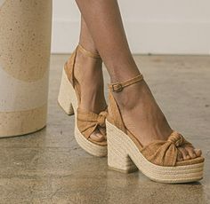 Our RACHEL platform espadrille sandals are right on trend! These latte colored cloth wedges feature a knotted front detail, 4" heel height, 1.5" platform, and adjustable ankle buckle closure. Details: Heel Height: 4" Platform: 1.5" Cloth material Open toe Ankle strap Padded footbed Beach Heels, Platform Espadrille Sandals, Platform Espadrilles, Cute Boots, Cute Sandals, Espadrille Sandals, Cloth Material, Boho Beach, Wedge Espadrille