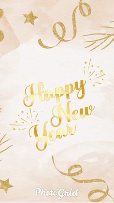 a happy new year greeting card with gold lettering and sparkles on the paper background