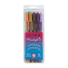 four multicolored markers in a package with the packaging on it's side