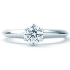 Product Description This listing is for a previously-owned Tiffany & Co. Solitaire Collection ring. The ring is a size 4.75 (US), made of platinum, and weighs 2.60 DWT (approx. 4.04 grams). It also has one round I-color, VS2-clarity diamond weighing 0.53 CTTW. Designer Tiffany & Co. Weight 2.60 DWT Collection Solitaire Ring Size 4.75 Condition Pre-owned Ref. Number R448570 Metal Platinum Packaging and Additional Features This Tiffany & Co. Solitaire  ring comes with  an original box and an original appraisal. * All sizes are approximate. New York Jewelers © 2019 All pictures are of the actual item. Please Note We ship all packages signature required. We do not ship to PO Boxes. Payment must be completed within 36 hours of sale, otherwise the item is relisted and a case is opened. About New Diamond White Rings With Vs Clarity And Round Cut, Platinum Ring With Prong Setting, Promise Diamond Ring Vs Clarity Round Cut, Promise Diamond Ring With Vs Clarity Round Cut, Vs Clarity Diamond Promise Ring With Round Cut, Timeless Round Diamond Ring With Vs Clarity, Classic Wedding Ring With Vs Clarity, Classic Round Wedding Ring With Vs Clarity, Classic 14k White Gold Round Cut Ring