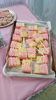 there are many desserts on the table ready to be eaten at this party or celebration