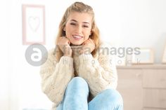 Beautiful smiling young woman in cozy warm sweater at home Caucasian Clothes, Weathered White, Warm Sweater, Warm Sweaters, Cozy Fall, Winter White