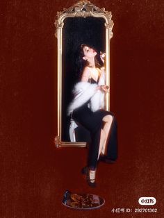 a woman sitting in front of a mirror with her legs crossed and one leg bent