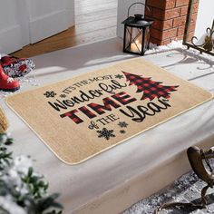 a christmas door mat that says it's the most wonderful time of the year