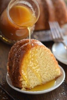 a bundt cake is being drizzled with honey