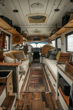 the inside of a camper with lots of furniture and decor on it's walls