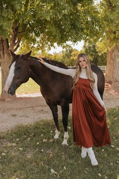 Get ready to turn heads in THE ADA SATIN MIDI DRESS! In a captivating amber color, this pretty dress is perfect for any occasion. With a midi length and skinny straps, it's both elegant and flirty. Plus, the tie back adds a touch of uniqueness to your outfit. A must-have for your wardrobe! Paired with THE CONNER RIBBED TURTLE NECK IN TAUPE & THE MIMI COWGIRL BOOTS IN WHITE Scoop neck Spaghetti strap Tie back Midi length 97% polyester, 3% spandex Dress runs true to size. Small (2-4), Medium (6-8) Happy Threads, Summer Goddess, Pink Desert, Spandex Dress, Exclusive Clothing, Pretty Dress, Satin Midi Dress, Amber Color, Cowgirl Boots