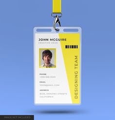 an id card with a man's face on the front and yellow lanyard attached to it