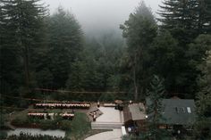 Among the Giant Redwoods, Sparrow Valley Retreat's reception area sets up to 120 guests. Included with the venue is the impressive 52 foot Alaskan milled, family-style table, built by Tania's husband, Taylor. Using a 57-inch chainsaw like a cheese slicer along the entirety of the tree, sitting up to 65 guests.  Additional tables are rented by a preferred local vendor. The concrete dance floor, designed and built by both Taylor and Tania, includes a speaker, disco ball, lighting and fire pit, perfect for a late night s'more or a sweet cuddle with the one you love. The warp around deck, includes a Redwood bar, lighting, and heaters. For those staying on property, there is a soaking tub and sauna designed with a picture window with views of the Redwoods forest. Forest Reception, Family Style Table, Picture Window, Sauna Design, The Redwoods, Cheese Slicer, Redwood Forest, Reception Area, Picture Windows