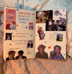 an open notebook with pictures of people and words written in spanish on the pages, sitting on a bed