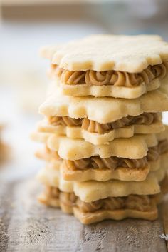 a stack of cookies sitting on top of a wooden table