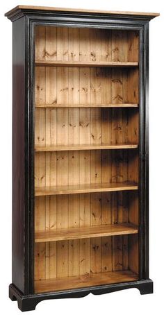 an old fashioned wooden bookcase with many shelves