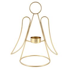 a gold candle holder with an angel design on the front and bottom, sitting on a white background