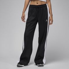 Craving something comfortable? Ideal for lounging at home and kicking back with friends, these smooth knit pants feature an elastic waist, pintuck detailing and a relaxed fit through the legs for optimal comfort. Nike Jordans Women, Activewear Print, Lounge Pants Womens, Jordans Women, Women Lifestyle, Fleece Pants, Tracksuit Bottoms, Pocket Bag, Knit Pants