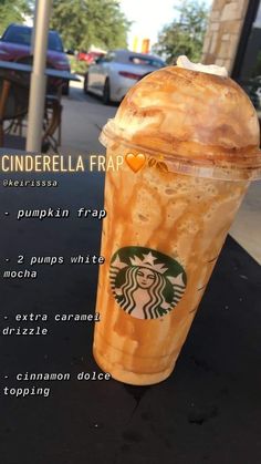 a starbucks frap drink sitting on top of a table