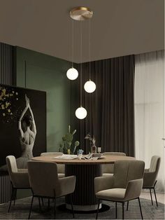 a modern dining room with round table and chairs