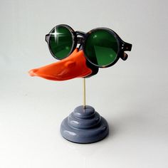 Duckbill eyeglass stand Funny sunglasses display, especially great for Kids by ArtAkimbo $40 on etsy Retro Sunglasses With Tinted Lenses For Gift, Retro Sunglasses With Tinted Lenses As Gift, Retro Sunglasses With Tinted Lenses As A Gift, Modern Glass Sunglasses As Gift, Novelty Sunglasses With Tinted Lenses As Gift, Novelty Sunglasses With Tinted Lenses For Gift, Room Jewelry, Eyeglass Stand, Fun Sunglasses