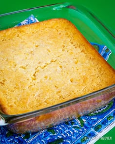 a casserole dish on a blue and green place mat