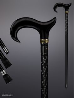 three different types of black and gold canes