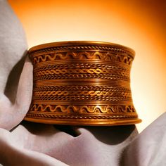 Ceremonial Handmade Metal Bangle, Bohemian Etched Cuff Bracelet As Gift, Bohemian Etched Cuff Bracelet Gift, Vintage Engraved Bangle For Festivals, Traditional Antique Finish Cuff Bangle Bracelet, Bohemian Antique Finish Cuff Bangle Bracelet, Bohemian Bangle Cuff Bracelet With Antique Finish, Traditional Handmade Brown Bangle, Bohemian Copper Bangle As A Gift