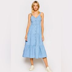 Nwt Super Cute Levi’s Denim Midi Dress..Tiered Style, Smocked In The Back, Button Up Front. Medium Women’s. Cotton Denim Midi Dress For Casual Wear, Cotton Denim Midi Dress For Dress Down Occasions, Blue Denim Buttoned Midi Dress, Denim Dresses With Button Closure For Day Out, Blue Denim Midi Dress With Buttons, Denim Midi Dress With Buttons, Casual Midi Length Denim Dress, Casual Midi Denim Dress, Levi's Casual Summer Dresses